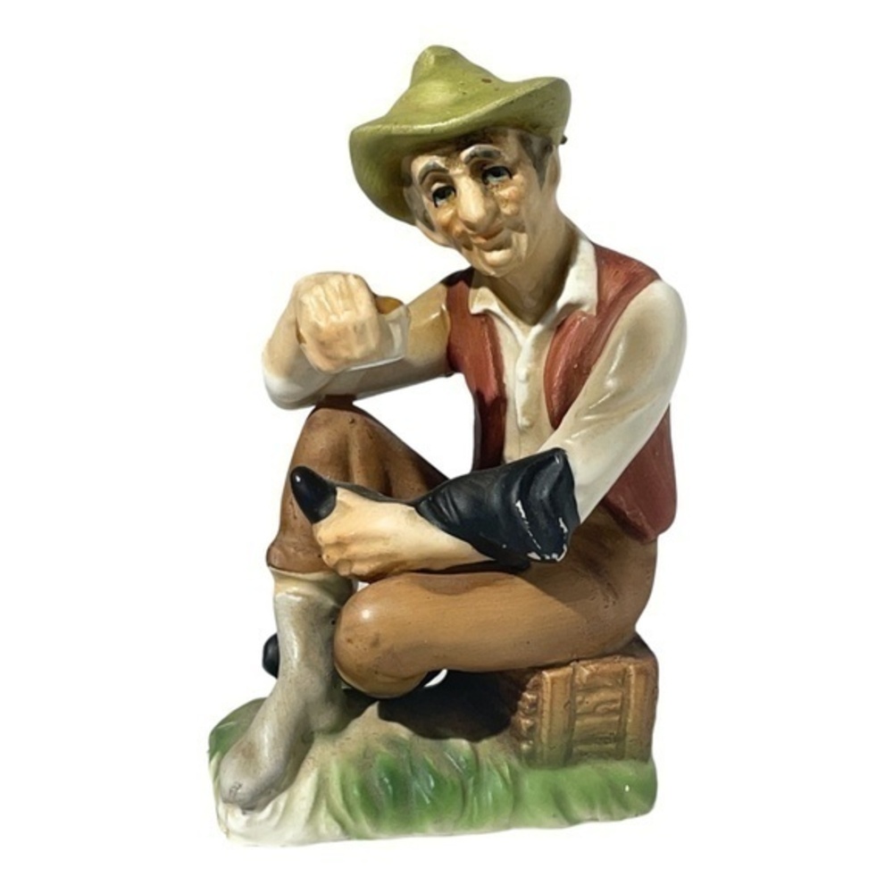 Vintage Norleans Japan Figurine Old Man Shining his Right￼ boot by hand .
